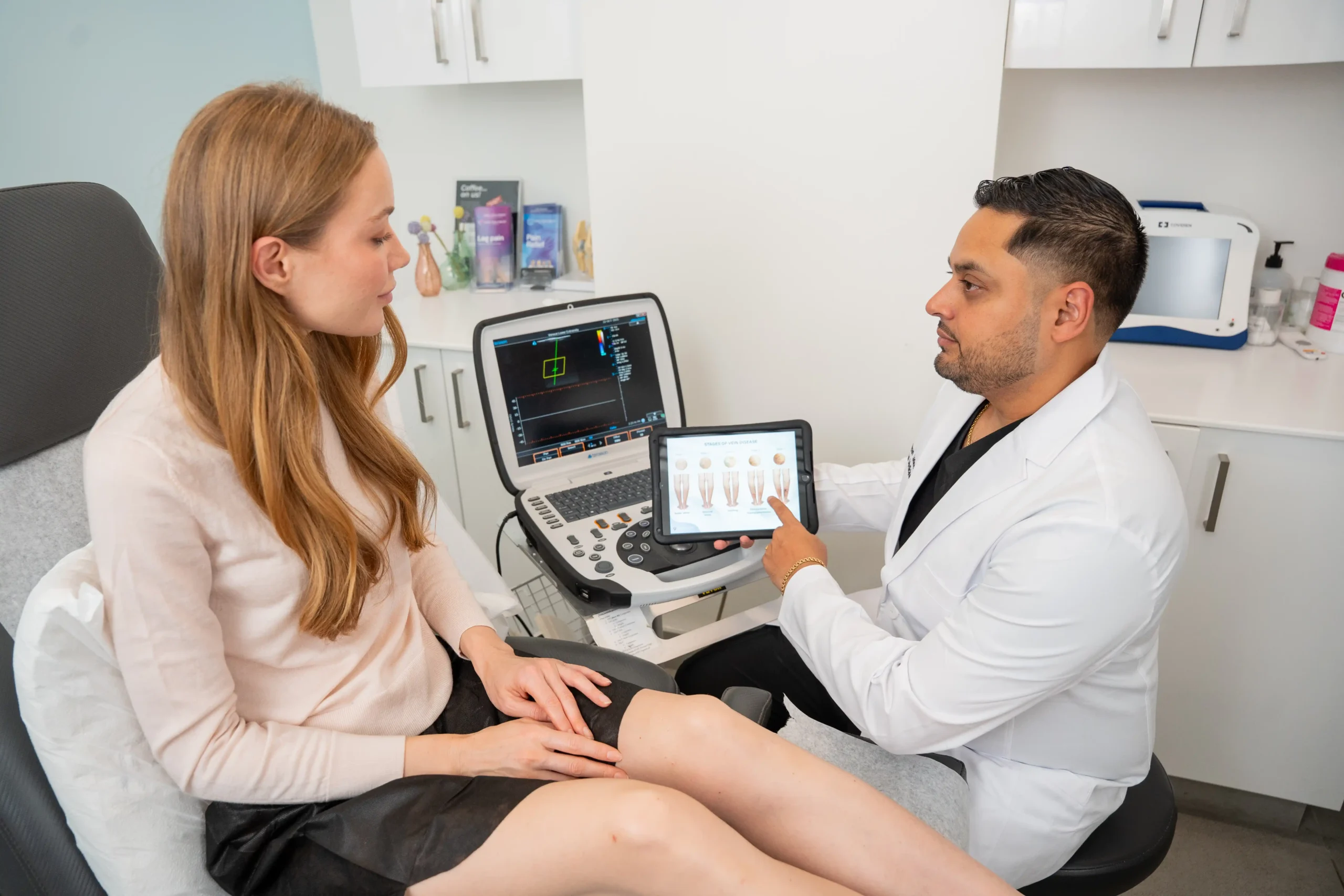 Vein doctor showing how it can help with CVI in his clinic in Yonkers, New York